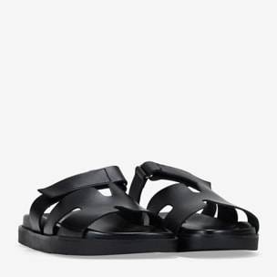 Sandalias planas negras en piel