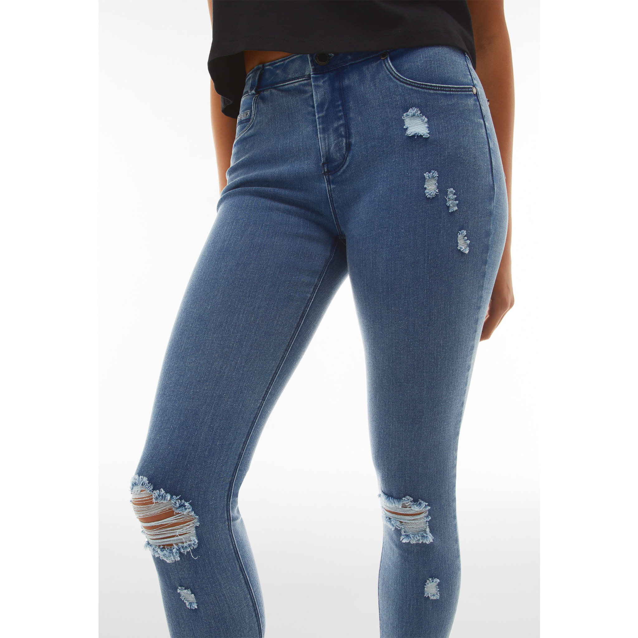 Jeans skinny vita regular in denim distressed sostenibile