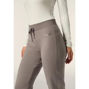 Tuta donna comfort fit in felpa con cappuccio stampe argento