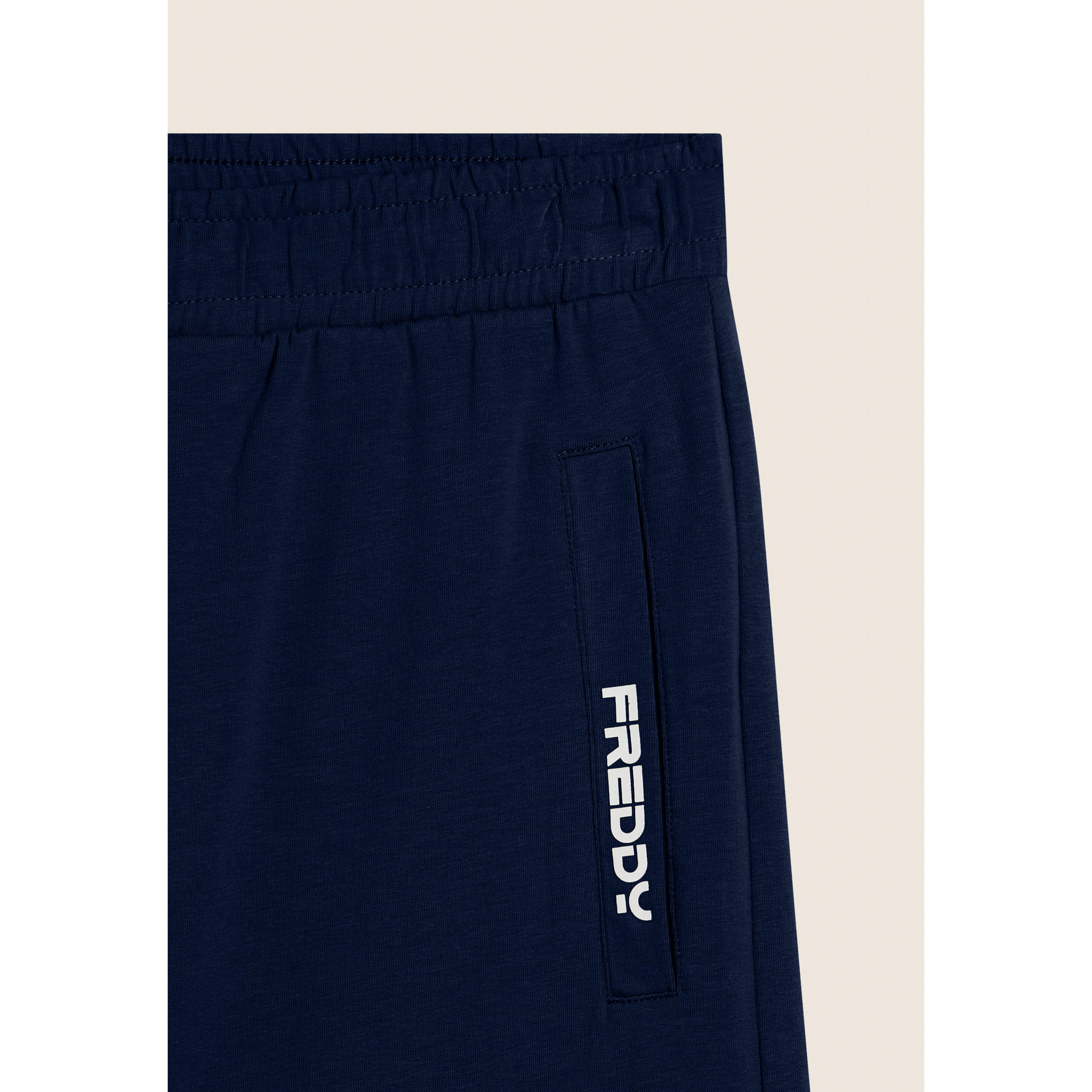 Pantaloni corti in jersey stretch con taschino
