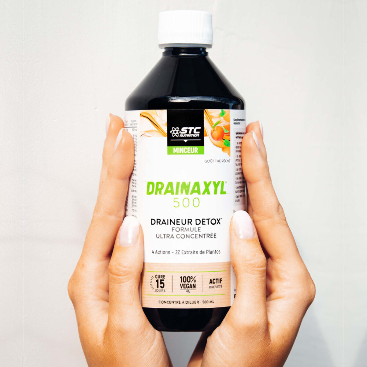STC NUTRITION - Drainaxyl 500 - 4 actions : Brûle-graisses, Digestion ventre plat, Circulation jambes légères, Drainant, Détoxifiant - Goût Thé Pêche - 23 Extraits de plantes dont Elim'Real® - 500ml