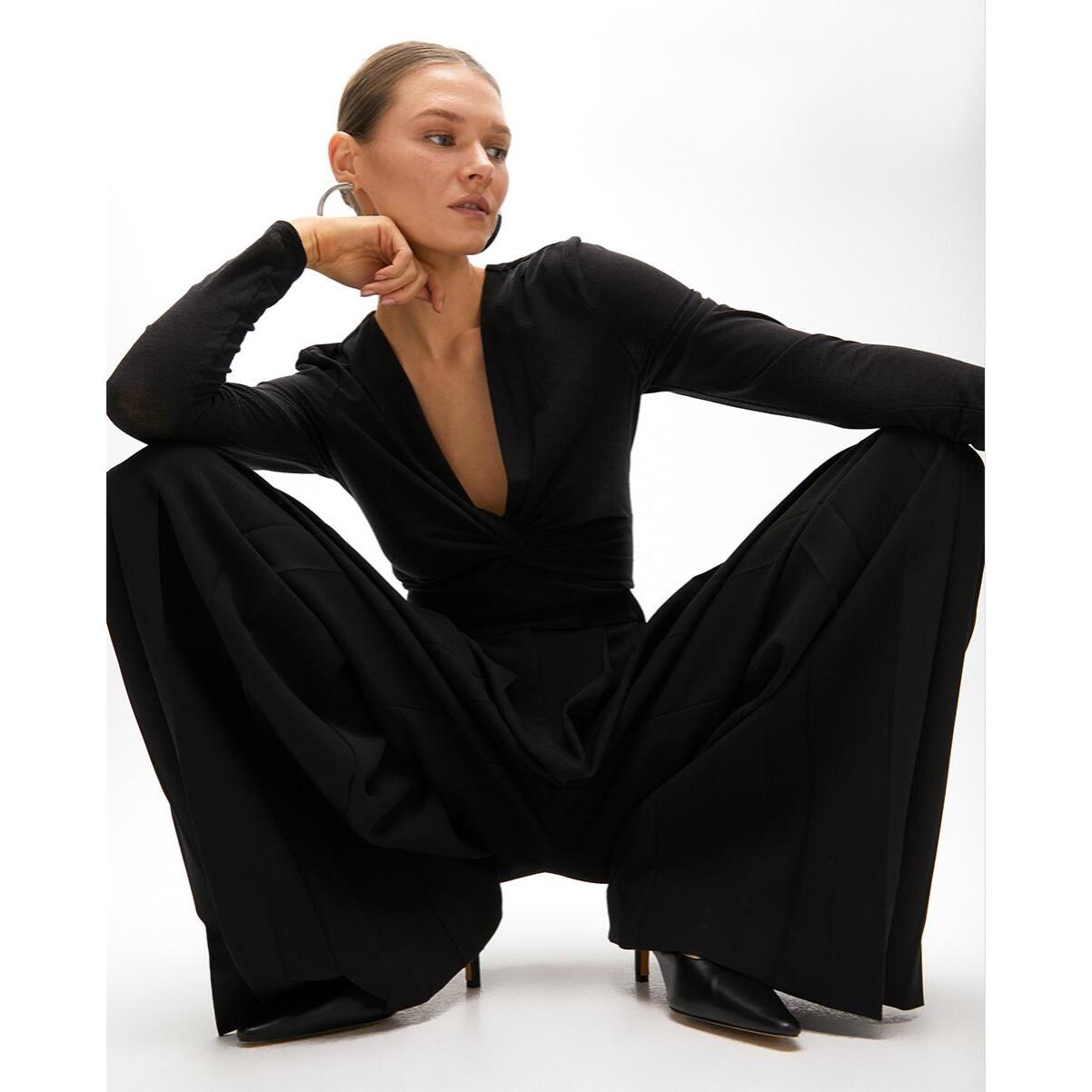 Pantaloni a gamba larga a pieghe