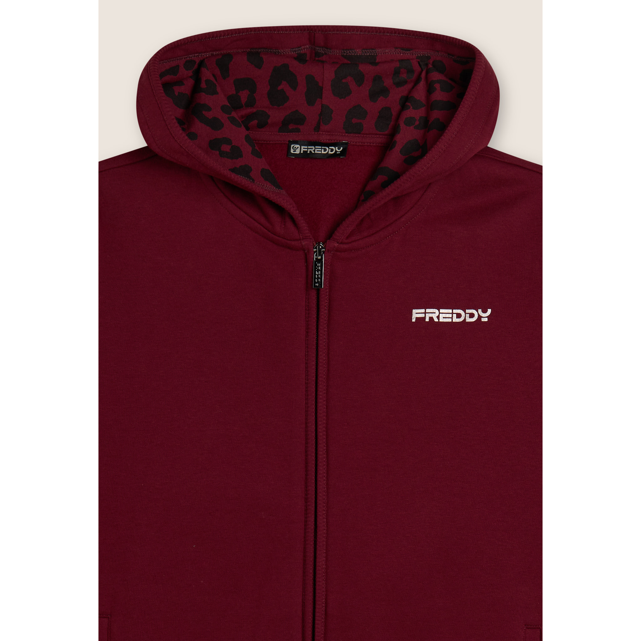 Tuta con interno cappuccio animalier e spacchi laterali