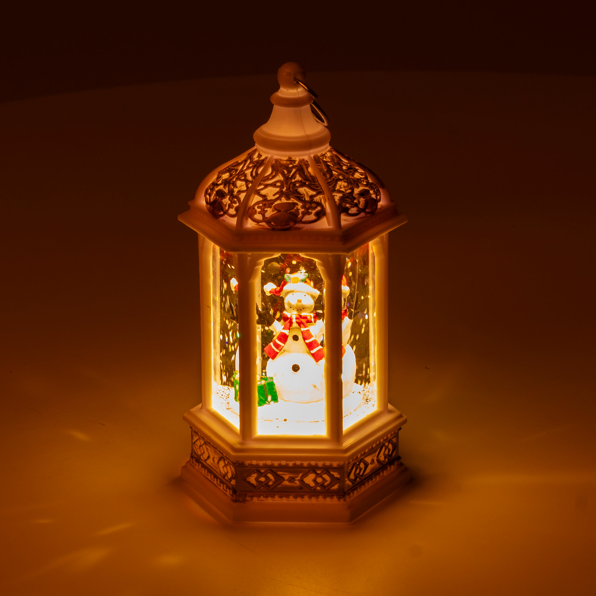 Lanterna bianca di Natale con luce ed effetto neve di 14 cm. Design Pupazzo di neve.