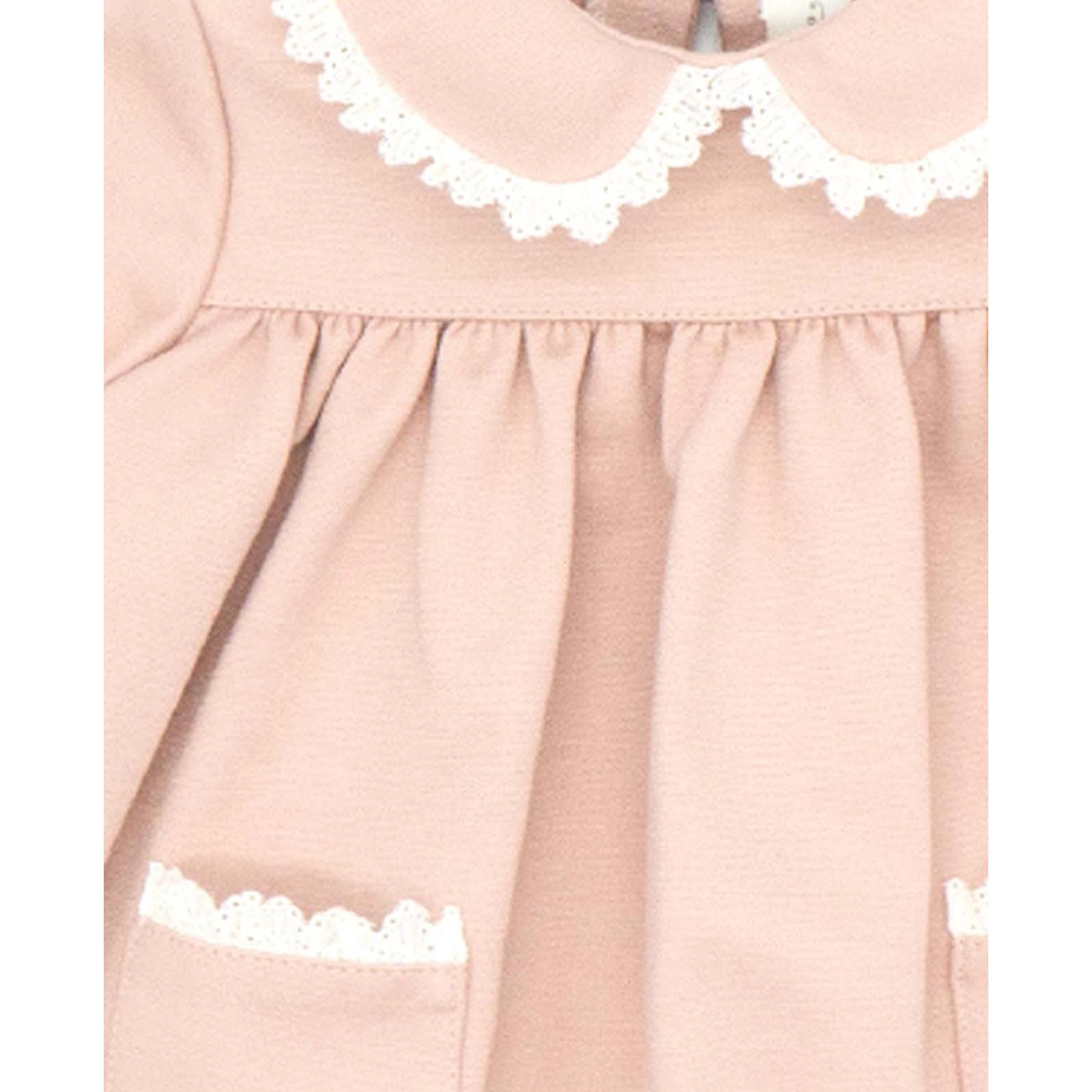 Vestido punto roma con cuello con volante rosa