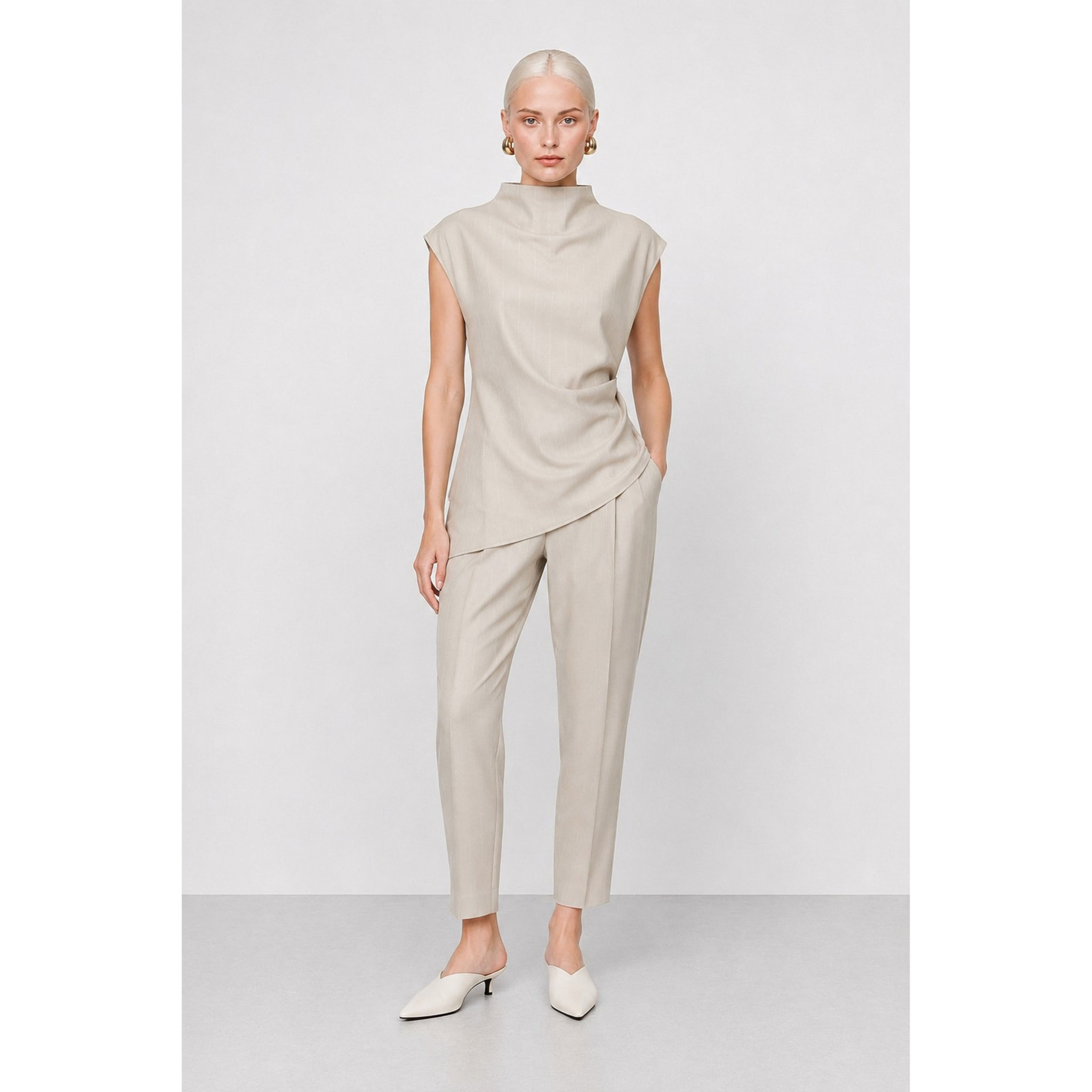 Kocca - Blusa da donna smanicata con collo alto e orlo asimmetrico Donna