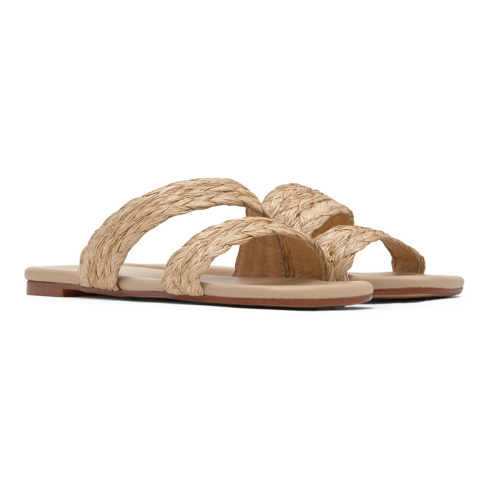 Sandalia plana slip-on Paz en rafia trenzada