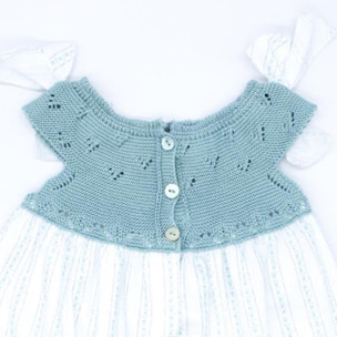 Vestido corto estampado flores y rayas, con cuerpo de punto verde y lazos en el hombro.