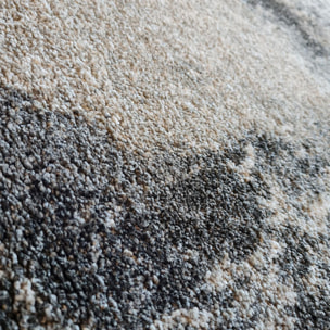 tapis moderne gris et taupe aux motifs abstraits