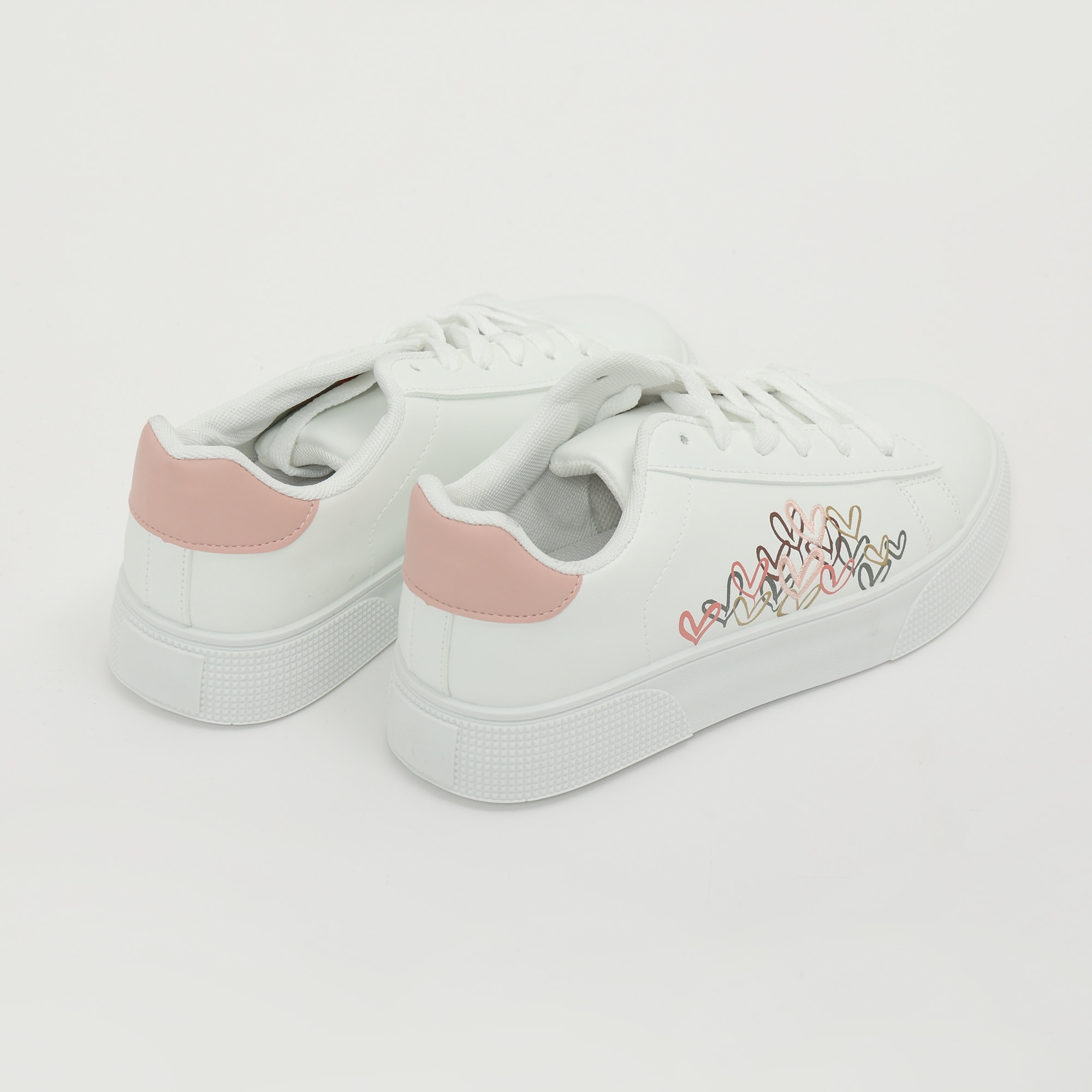 Sneakers in simil pelle con ricamo laterale