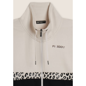 Tuta con zip e collo alto decorata da inserti animalier