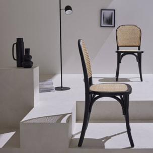Lot de deux chaises vintage noires en bois avec assise et dossier en rotin