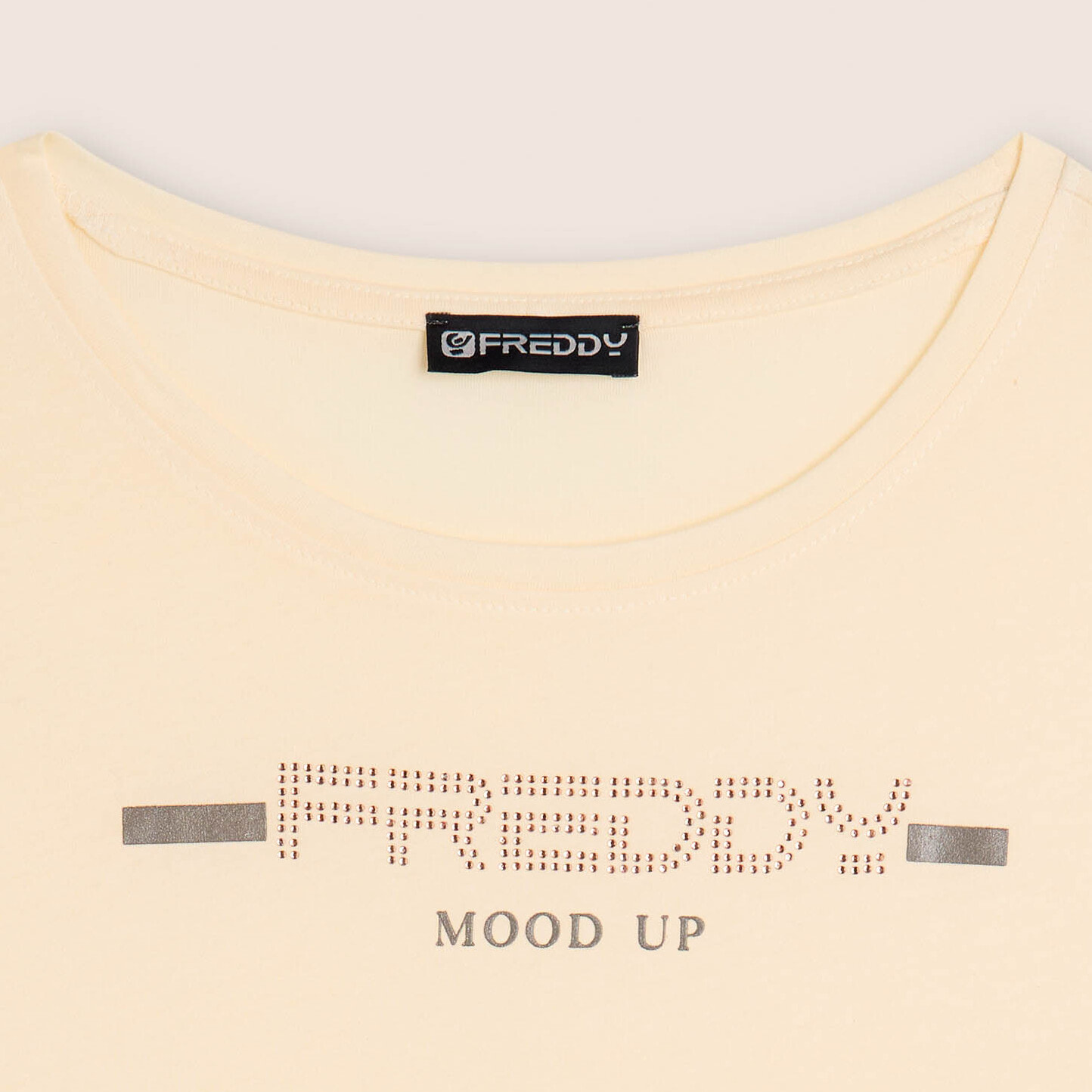 T-shirt da donna a manica lunga con fondo stondato