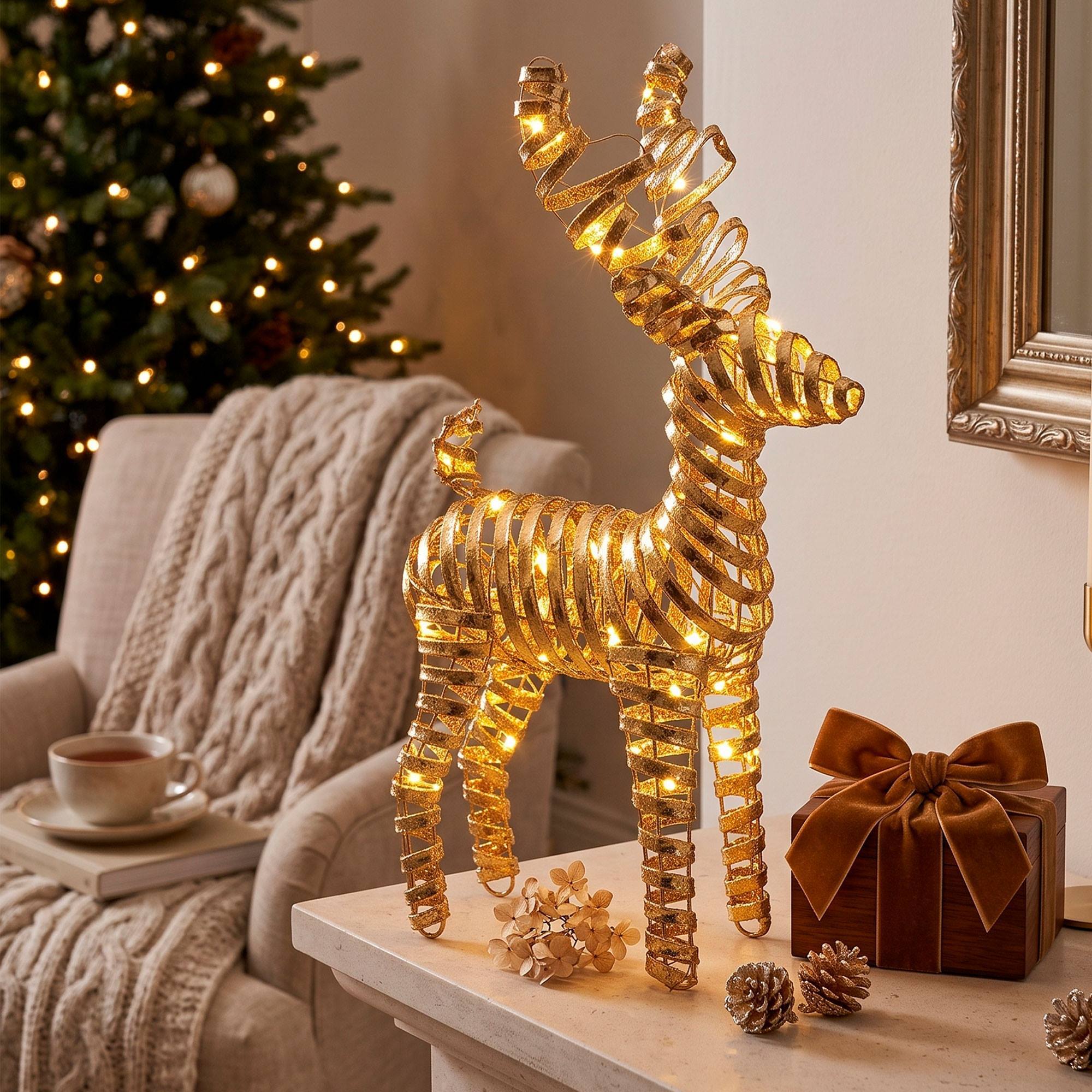 Reno navideño led dorado con 30 microled blanco cálido, con temporizador 24x9x37 cm