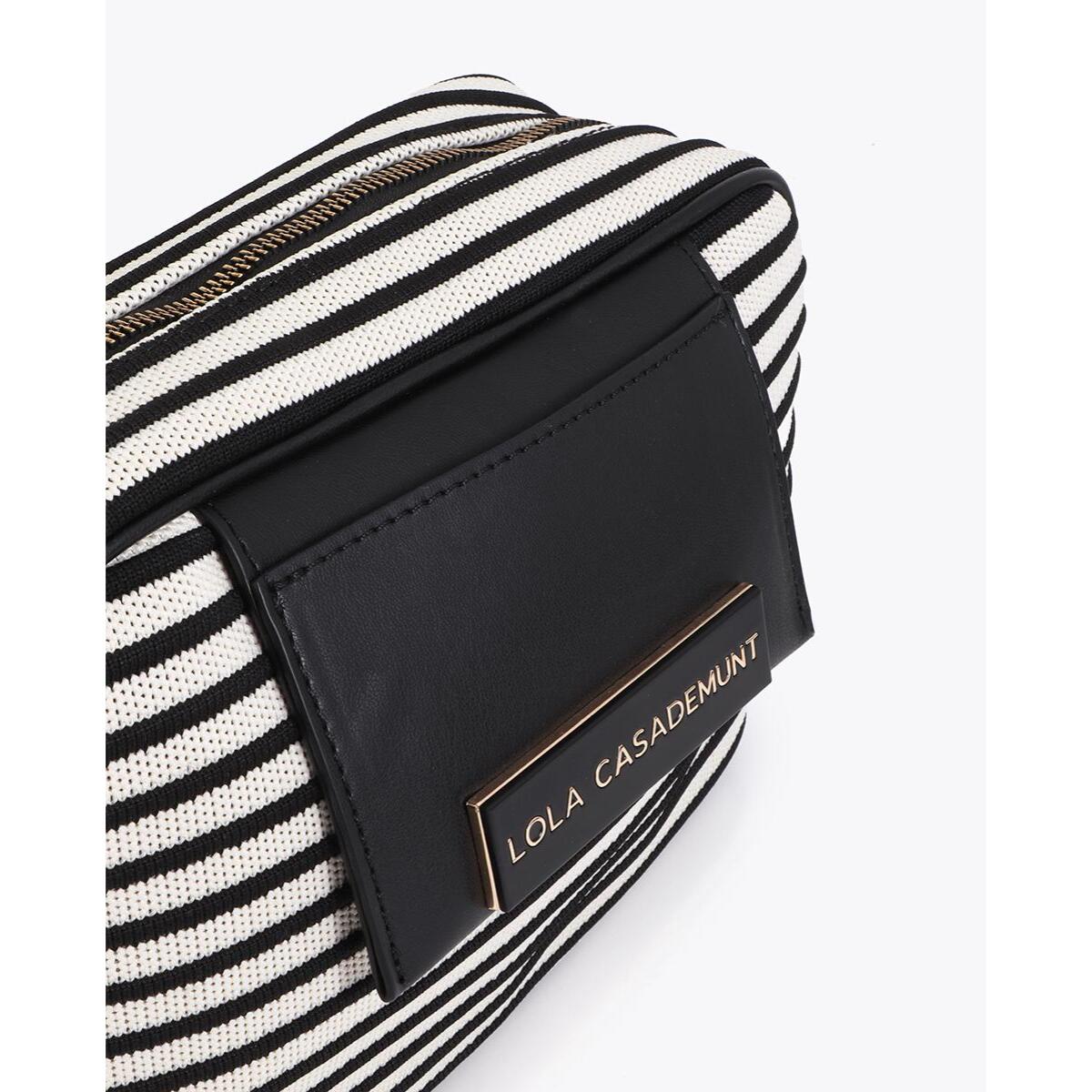 Tessuto a righe incrociate abbinato ad effetto pelle