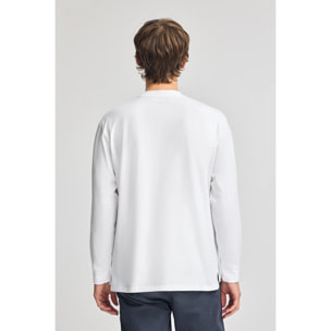 Camiseta blanca holgada con detalle Polo Club