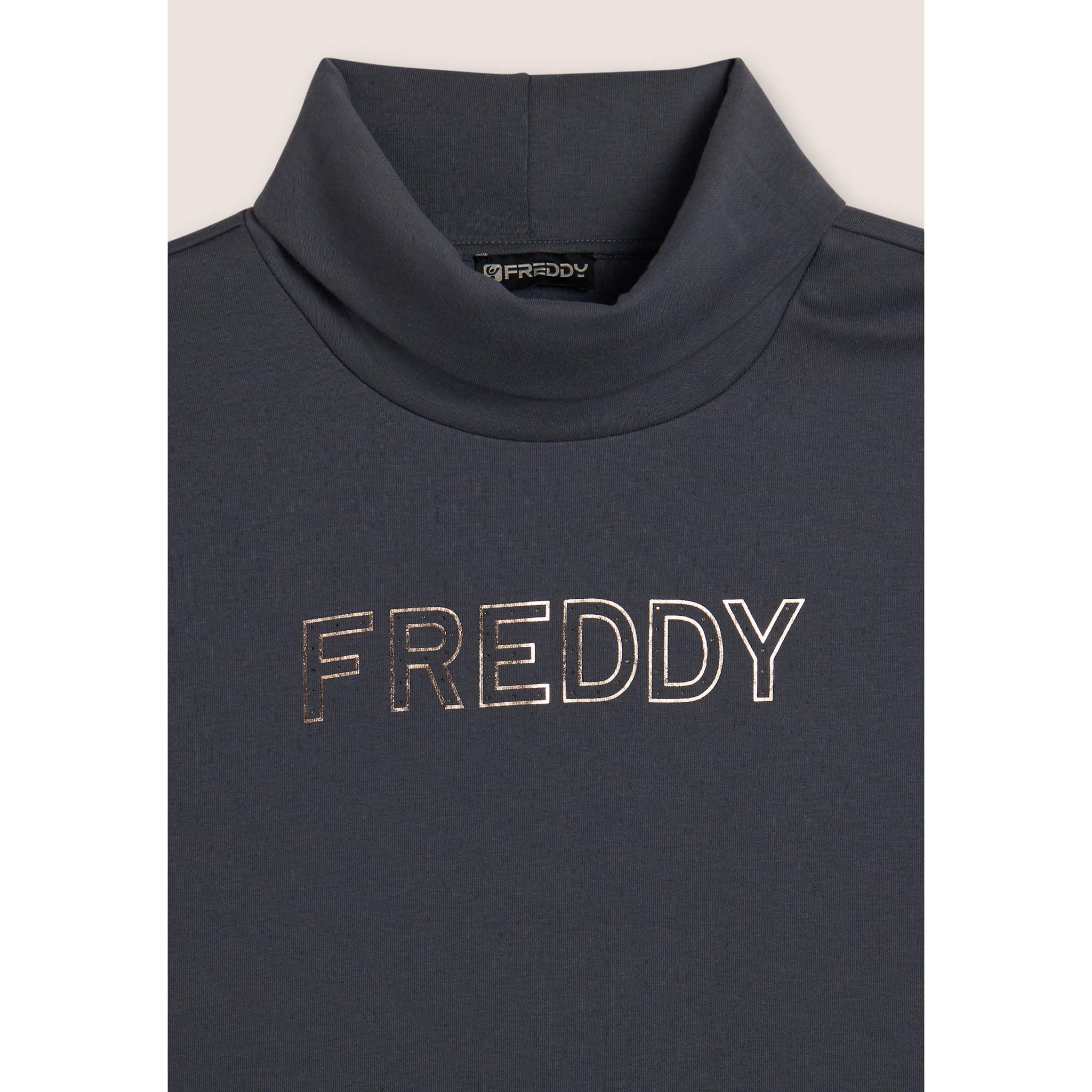 Tuta con collo risvoltabile e logo decorato da borchie