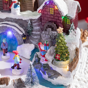 HOMCOM Pueblo Navideño Escena Navideña Iluminado con Luces LED Árbol Giratorio y Pista de Patinaje Decoración Navideña sobre Mesa 32x25,5x24 cm Multicolor