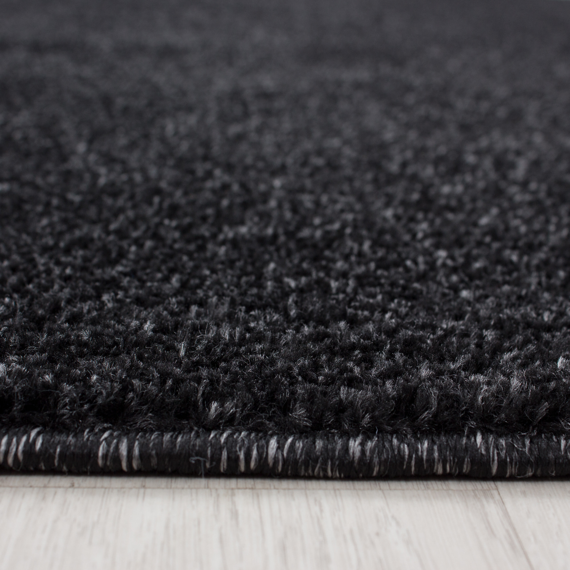 CALIFORNIE - Tapis rond uni à poils courts Anthracite