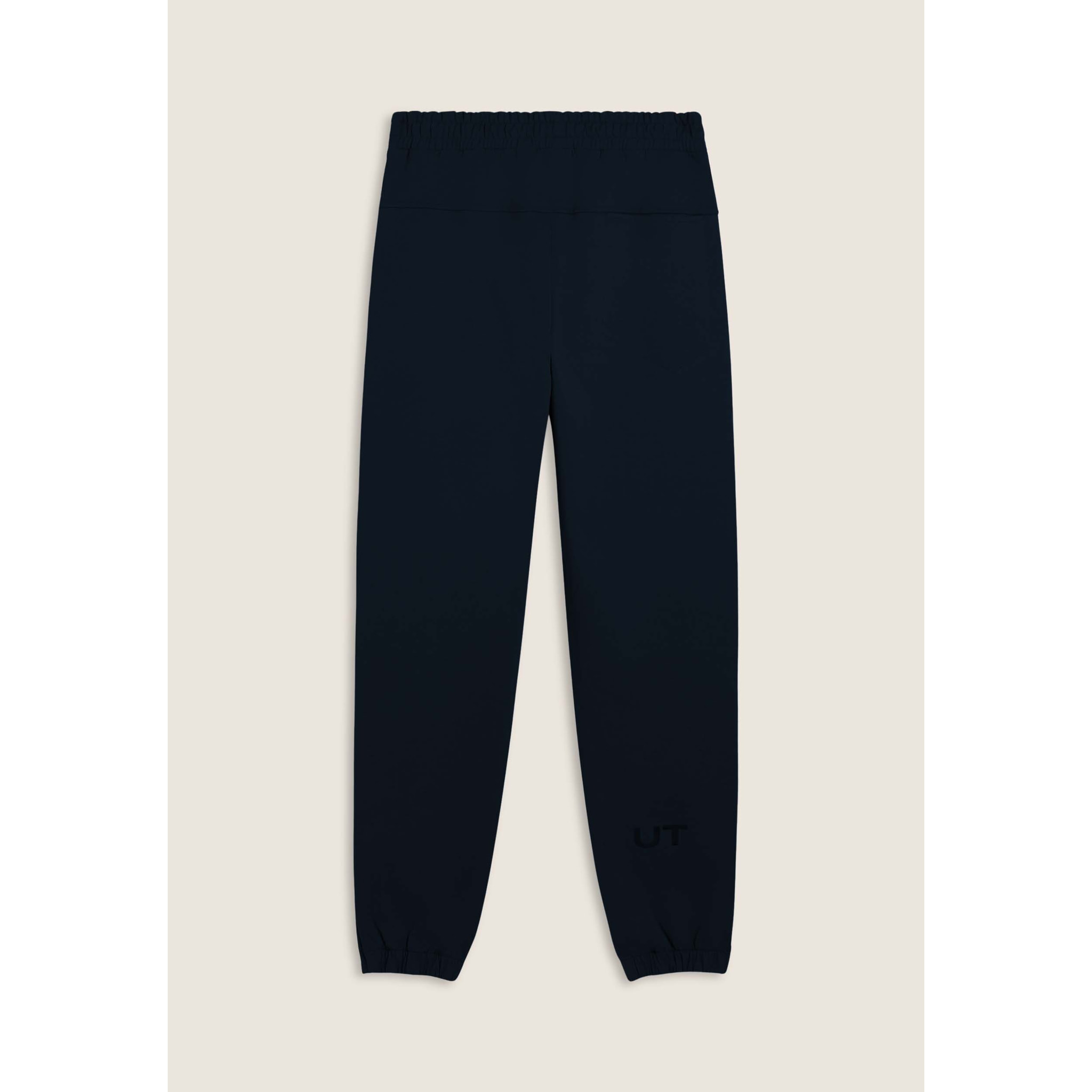 Pantaloni slim in interlock con dettagli lucidi
