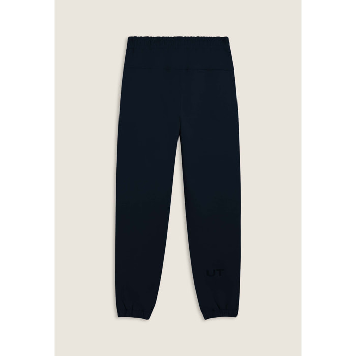 Pantaloni slim in interlock con dettagli lucidi