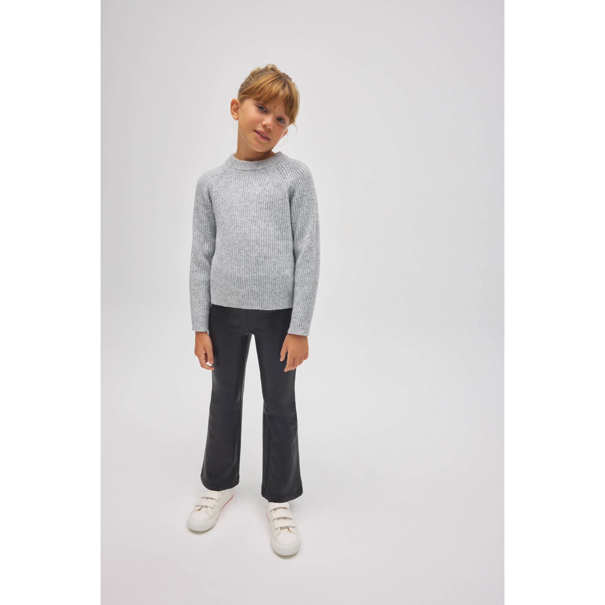 Pantaloni termici svasati neri effetto pelle da bambina