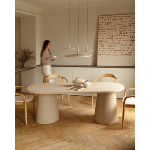Table de salle à manger ovale en microciment ton beige en différentes tailles