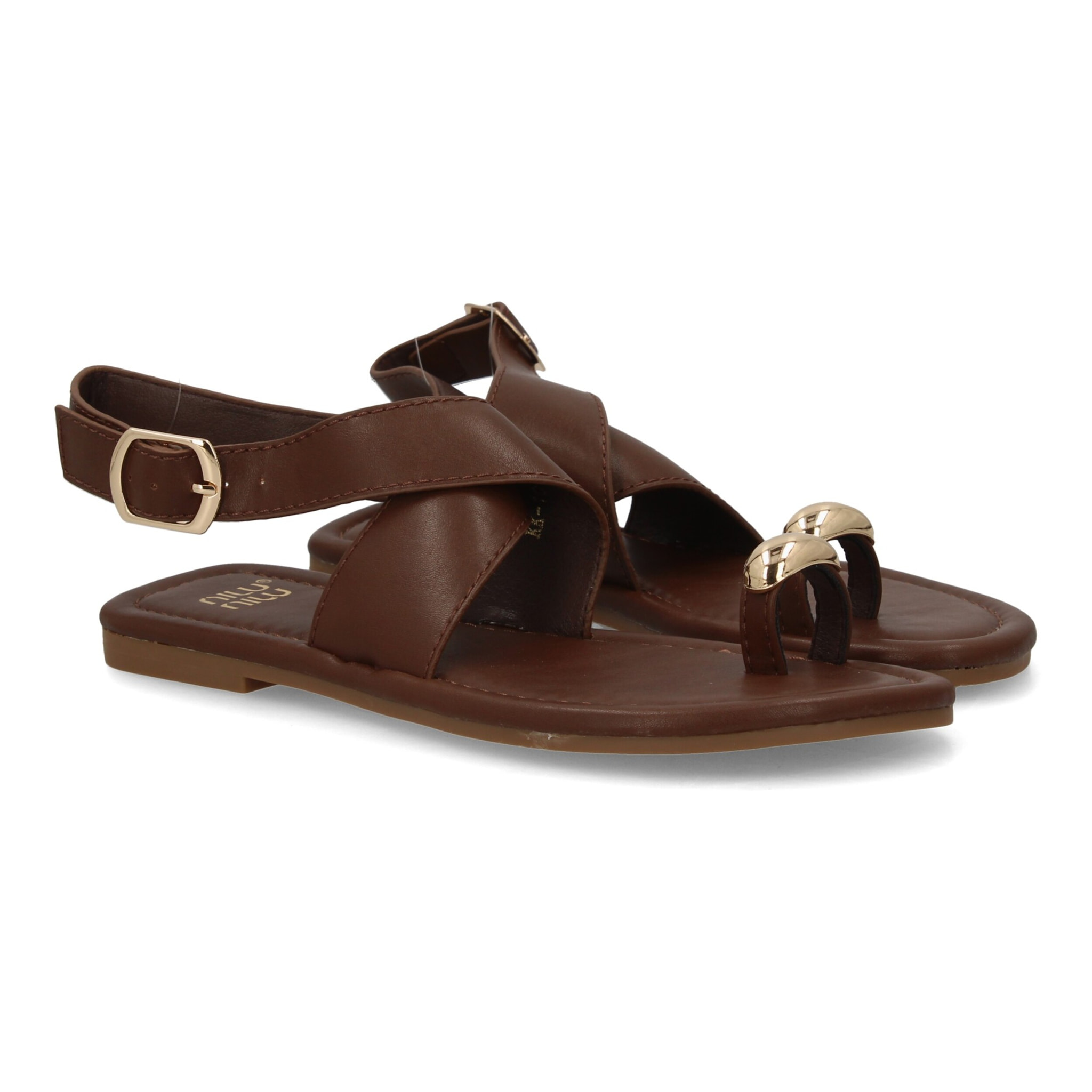 Sandalias planas elegantes mujer con adorno metálico.