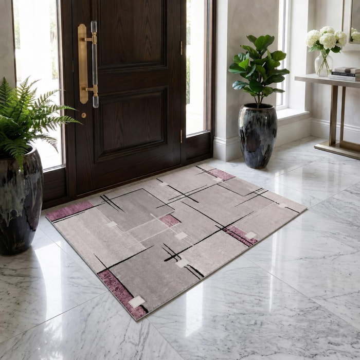 Petit tapis Povo aux motifs géométriques