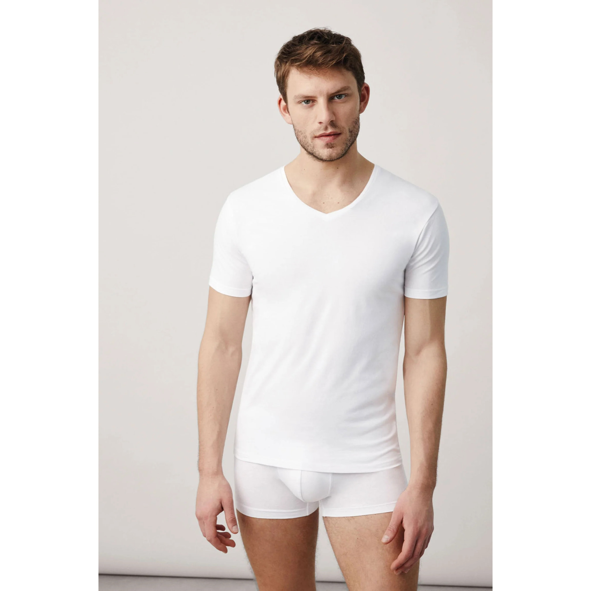 Maglietta bianca in cotone a maniche corte con scollo a V