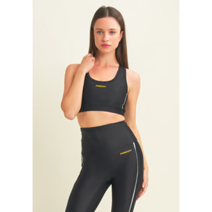 Top tecnico con spalline incrociate e profili bianchi