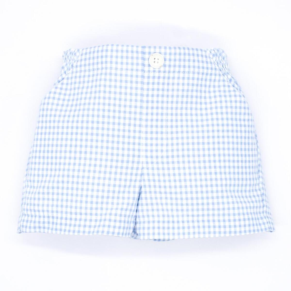 Bermuda vichy azul. Con bolsillos, botón y dibujo de la bragueta.