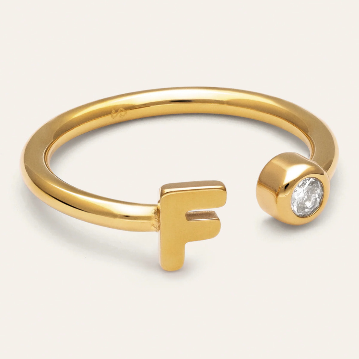 Anillo Personalizado Letter Spark Acero Baño Oro