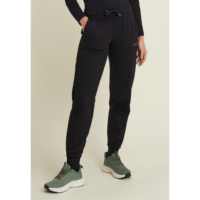 Pantaloni con fondo elasticizzato e tasche applicate