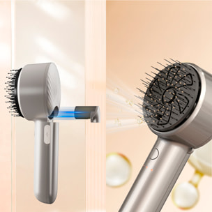 Pettine atomizzatore con massaggio a due velocità e base.