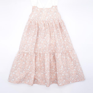 Vestido midi de flor rosa. Falda de volantes y tirantes cruzados en la espalda.