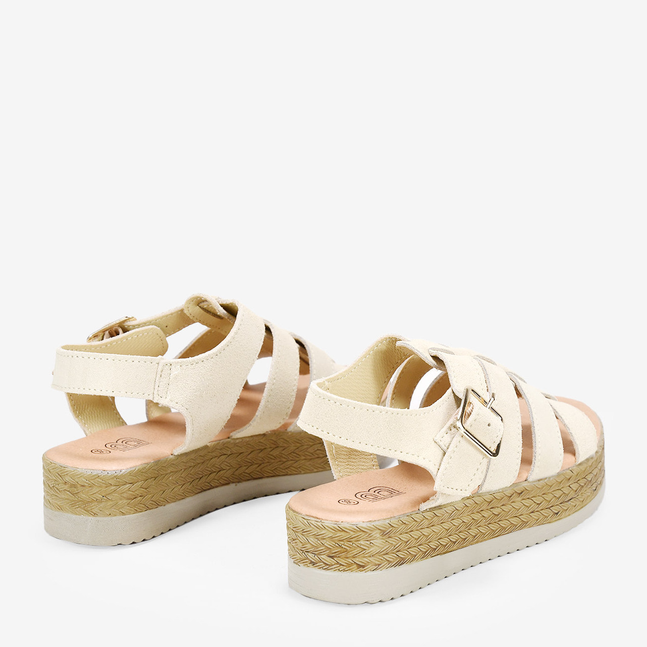 Sandalias de piel beige cangrejeras con plataforma de esparto