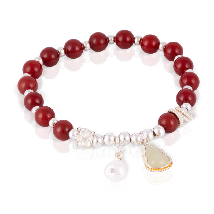 Pulsera elástica de cuentas granates de agata con detalles en plata de ley 925.