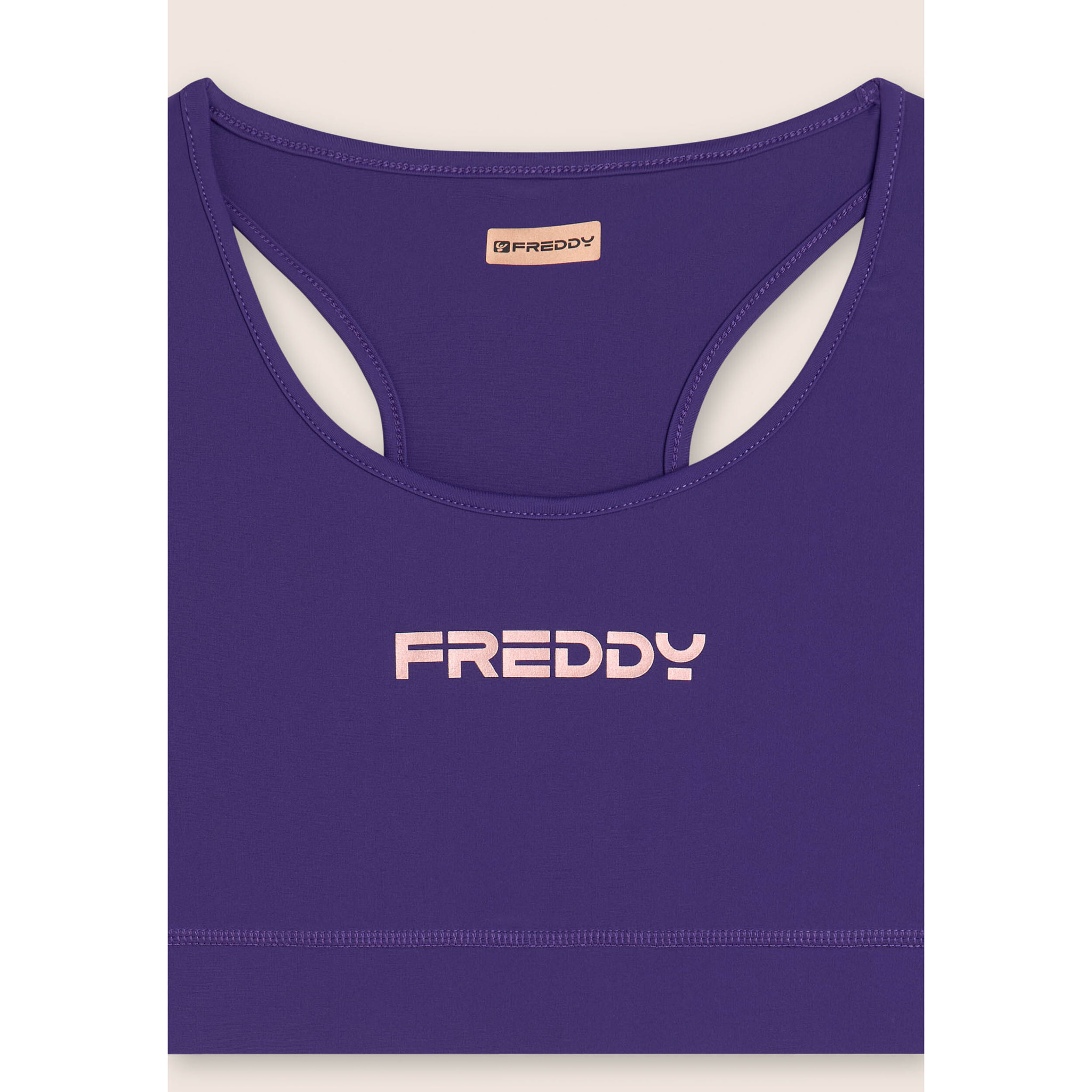 Top sportivo con retro vogatore elasticizzato