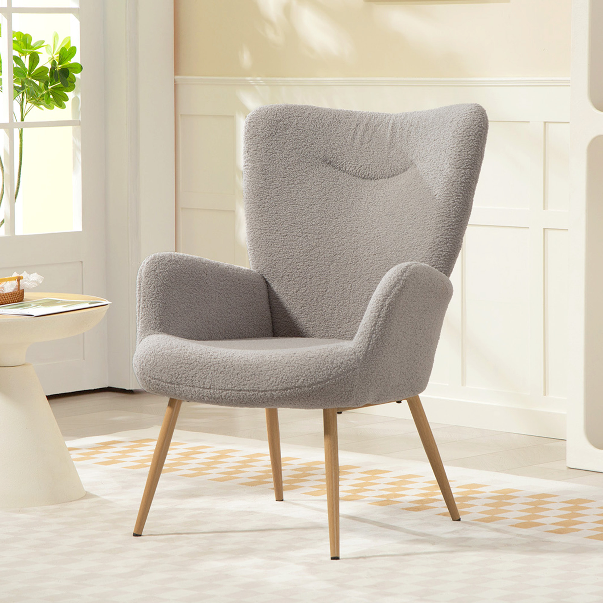 Fauteuil bouclette design à oreilles piètement métal effet bois gris