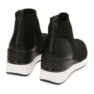 Slip-on nere in tessuto, zeppa 7 cm