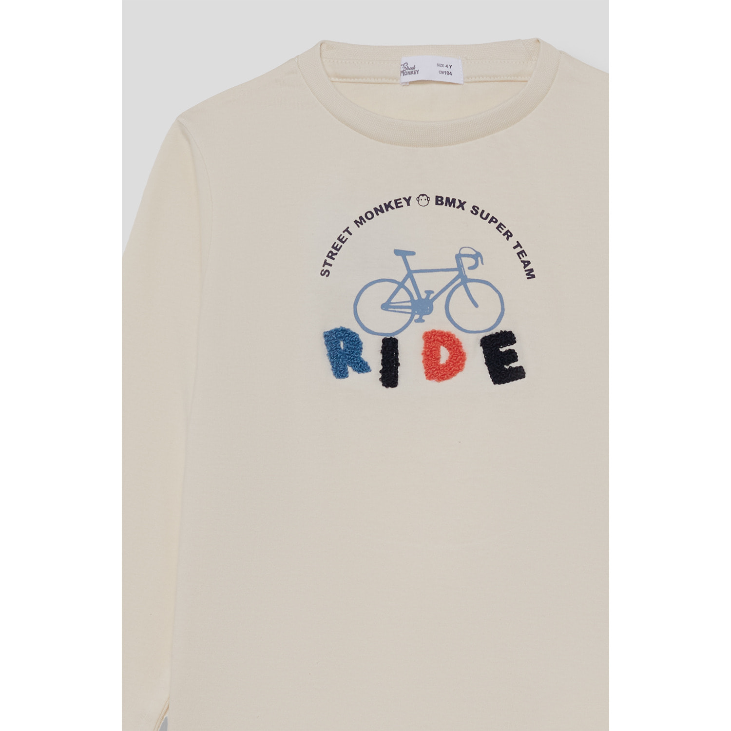 Camiseta niño crudo de manga larga de punto, estampado de bicicleta y texto RIDE, cuello redondo | Color: Crudo | Street Monkey