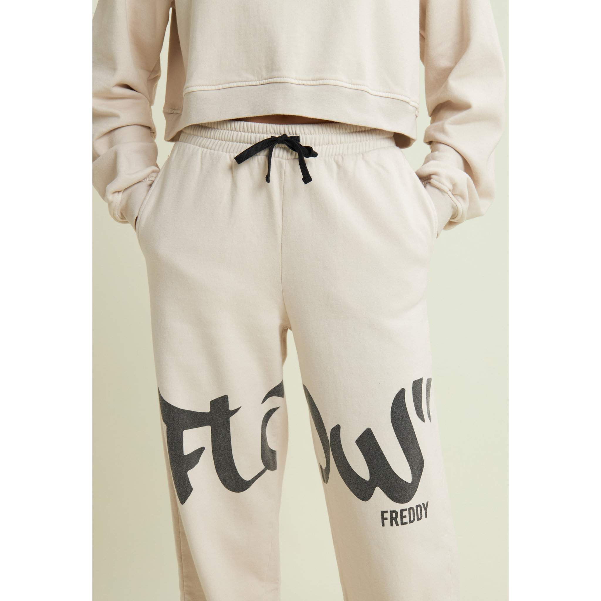 Pantaloni in felpa con stampa Flow e fondo raccolto