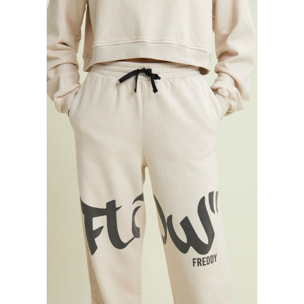 Pantaloni in felpa con stampa Flow e fondo raccolto