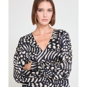 Blusa stampata con maniche a sbuffo e scollo a V