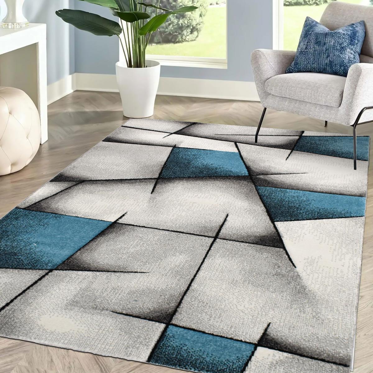 tapis salle à manger 200x290 tissé turquoise rectangle motif géométrique