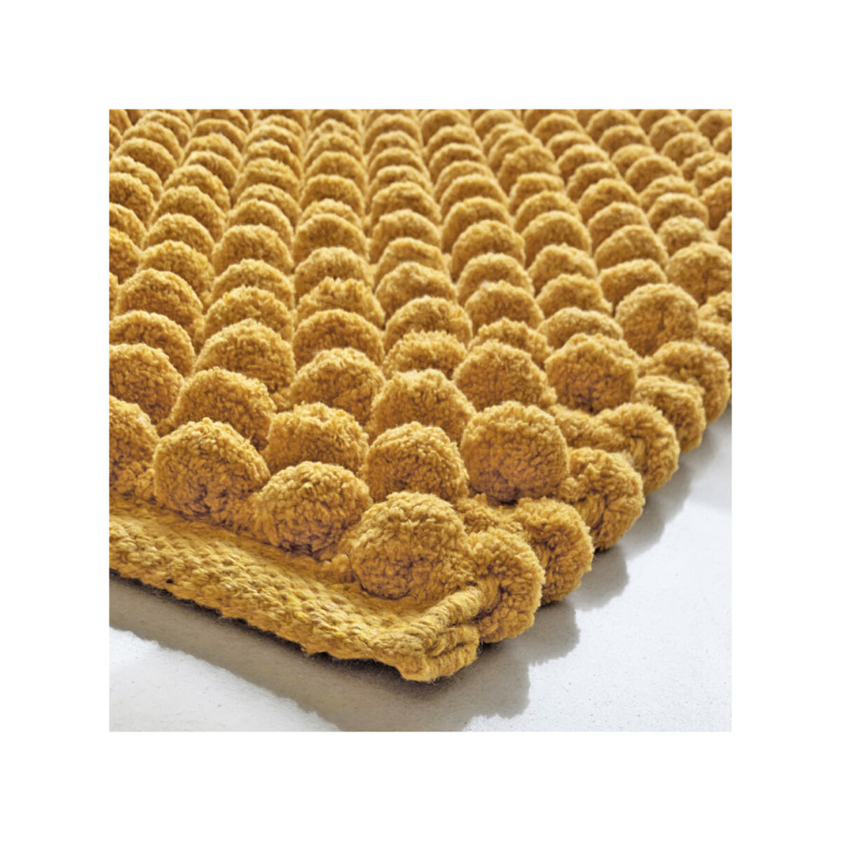 Tapis de salle de bain rectangulaire 40 x 60 cm avec pompons - 6 coloris - POP