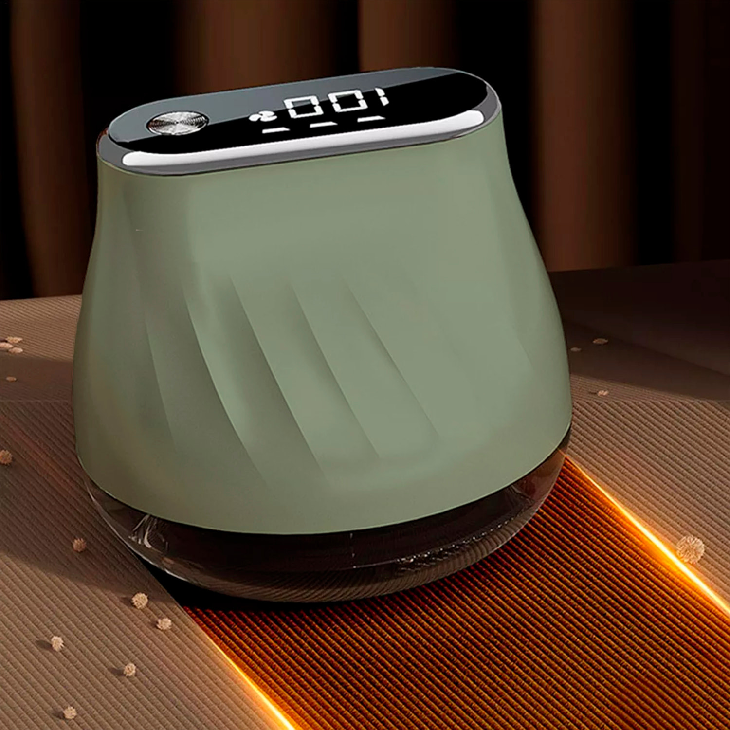 Quitapelusas de mano, con diseño ergonómico compacto. Cuenta con pantalla LCD y tres niveles de potencia.
