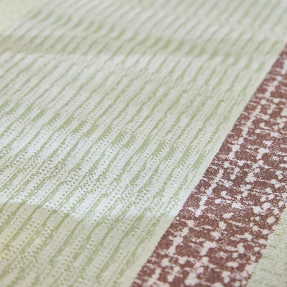 Nappe pur coton enduit 205 g/m² motif jacquard vert orange Mille galets terre cuite