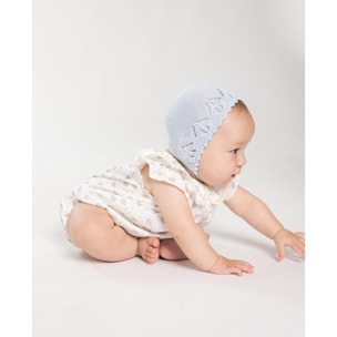 Pelele estampado de erizos, con volante en el cuello y en la sisa.